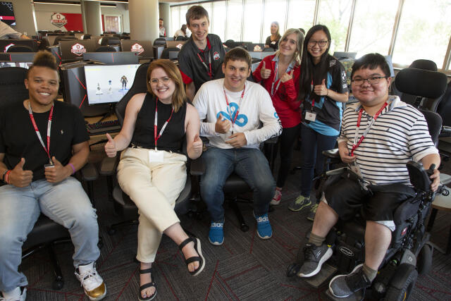 Group of students in front of computers at Esports Arena